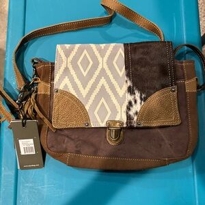 MYRA Cowhide leather and canvas crossbody bag